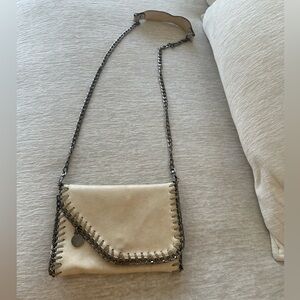 Stella McCartney cream colored purse with silver hardware